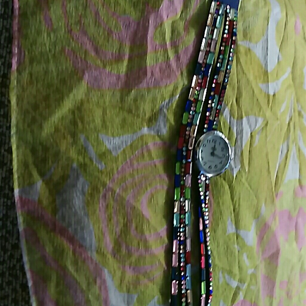 Wrapped around watch with crystals on it